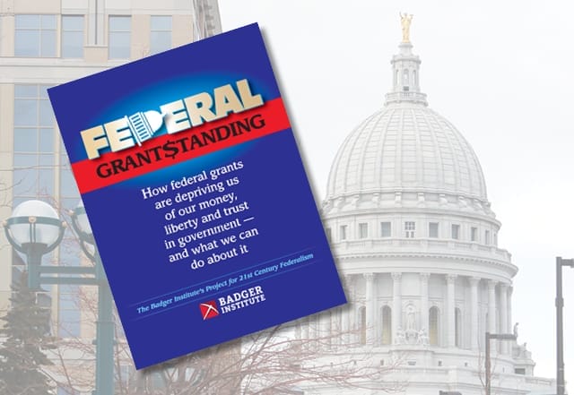Federal Grant$standing book over background of Madison, WI Capitol building