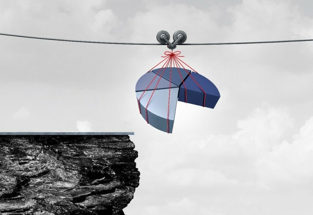 Graphic of pie chart sections being dangerously dangled over a cliff.