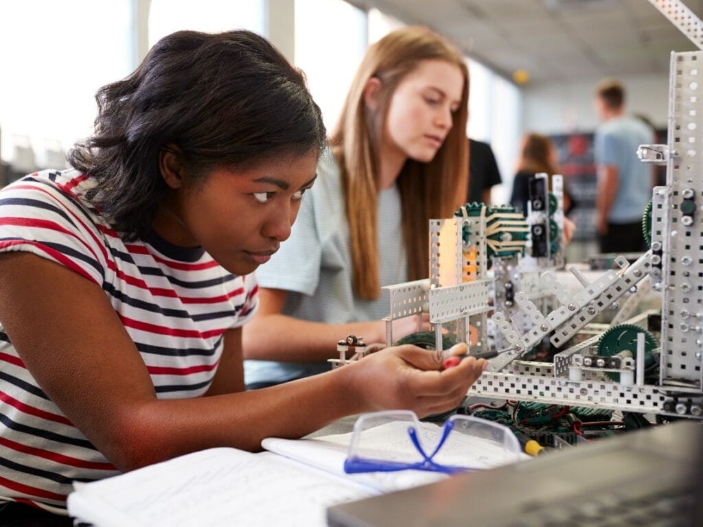 Two females working on engineering project