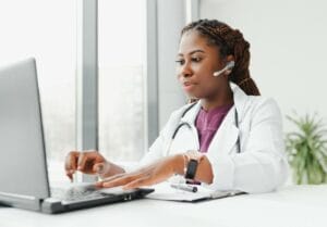 Wisconsin doctor practicing direct primary care via video messaging and telehealth.