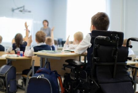 Disabled child in wheelchair participating in class as part of Wisconsin’s school choice program