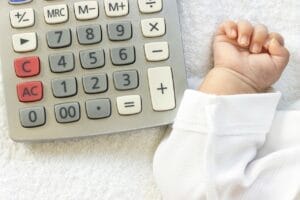 Calculator with a baby off to the side