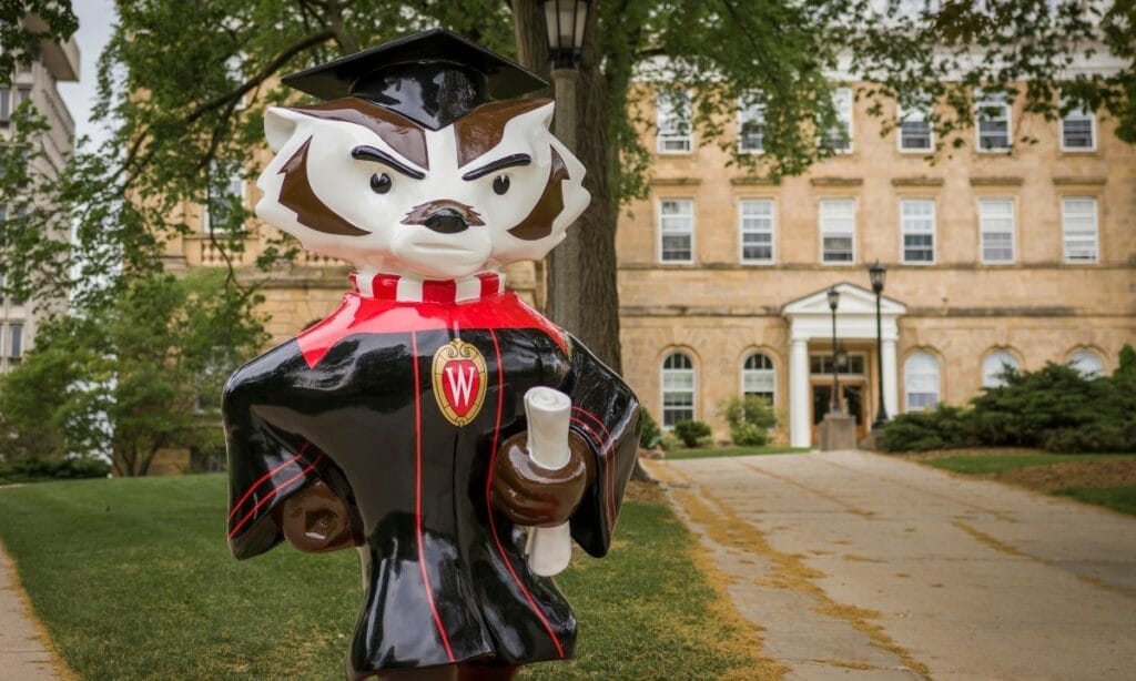 Statue of UW-Madison’s mascot Bucky in graduation cap and gown