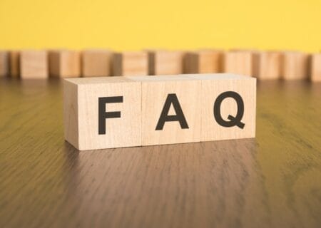 Blocks with the letters F, A, Q — indicative of frequently asked questions pertaining to Wisconsin’s 2024 constitutional amendment vote