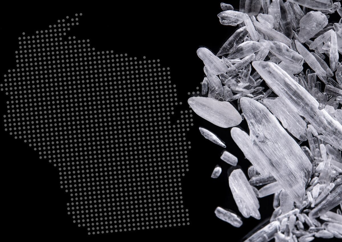 Graphic with the outline of the state of Wisconsin next to methamphetamine crystals