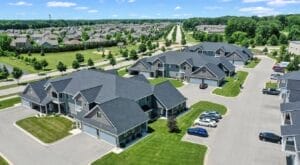 Aerial view of Hobart, WI apartment homes and adjacent housing subdivision